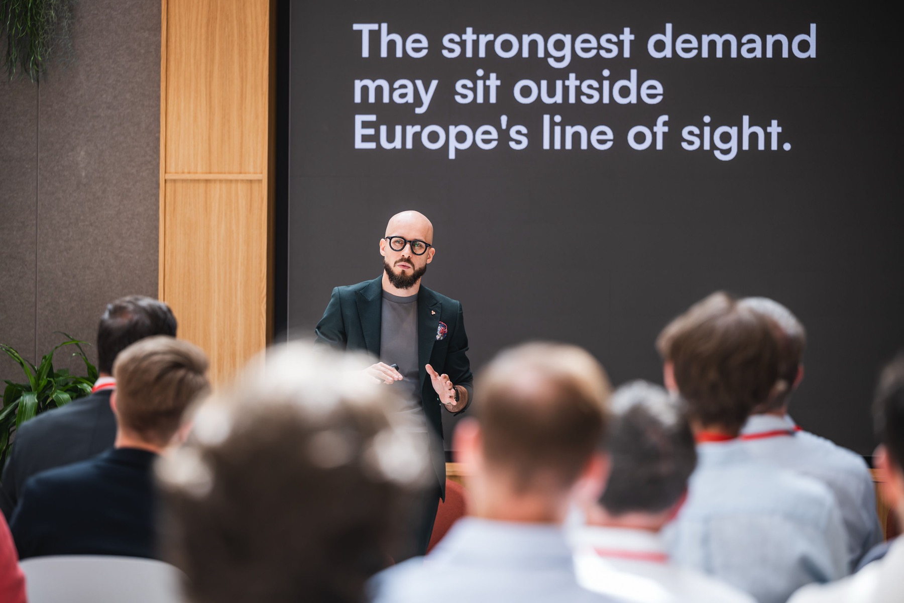 Anton Titov presenting at Crypto & Banking Day in Prague on 11 May 2026.
